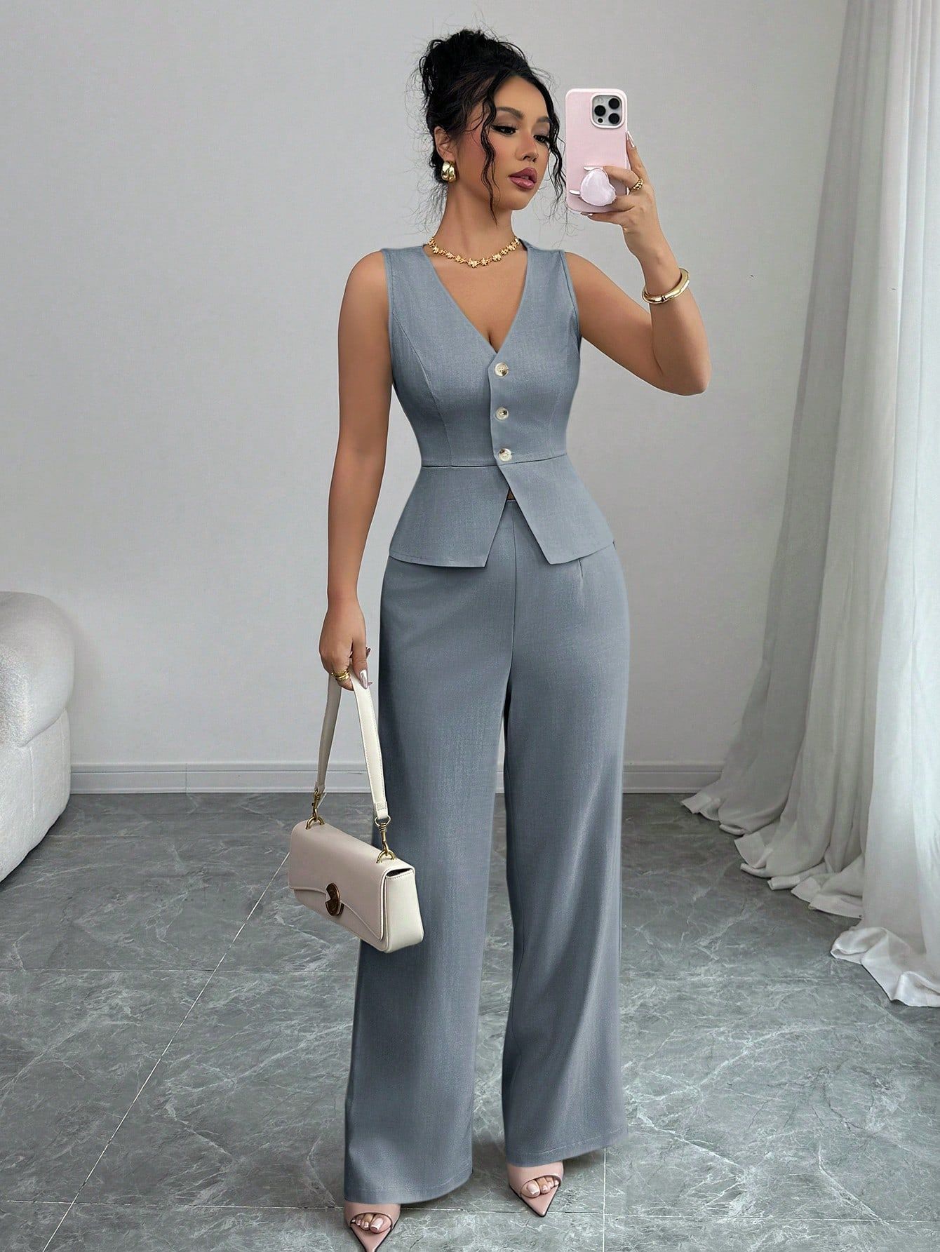 Conjunto de dos piezas de chaleco ajustado sin mangas de color sólido y pantalones de cintura alta